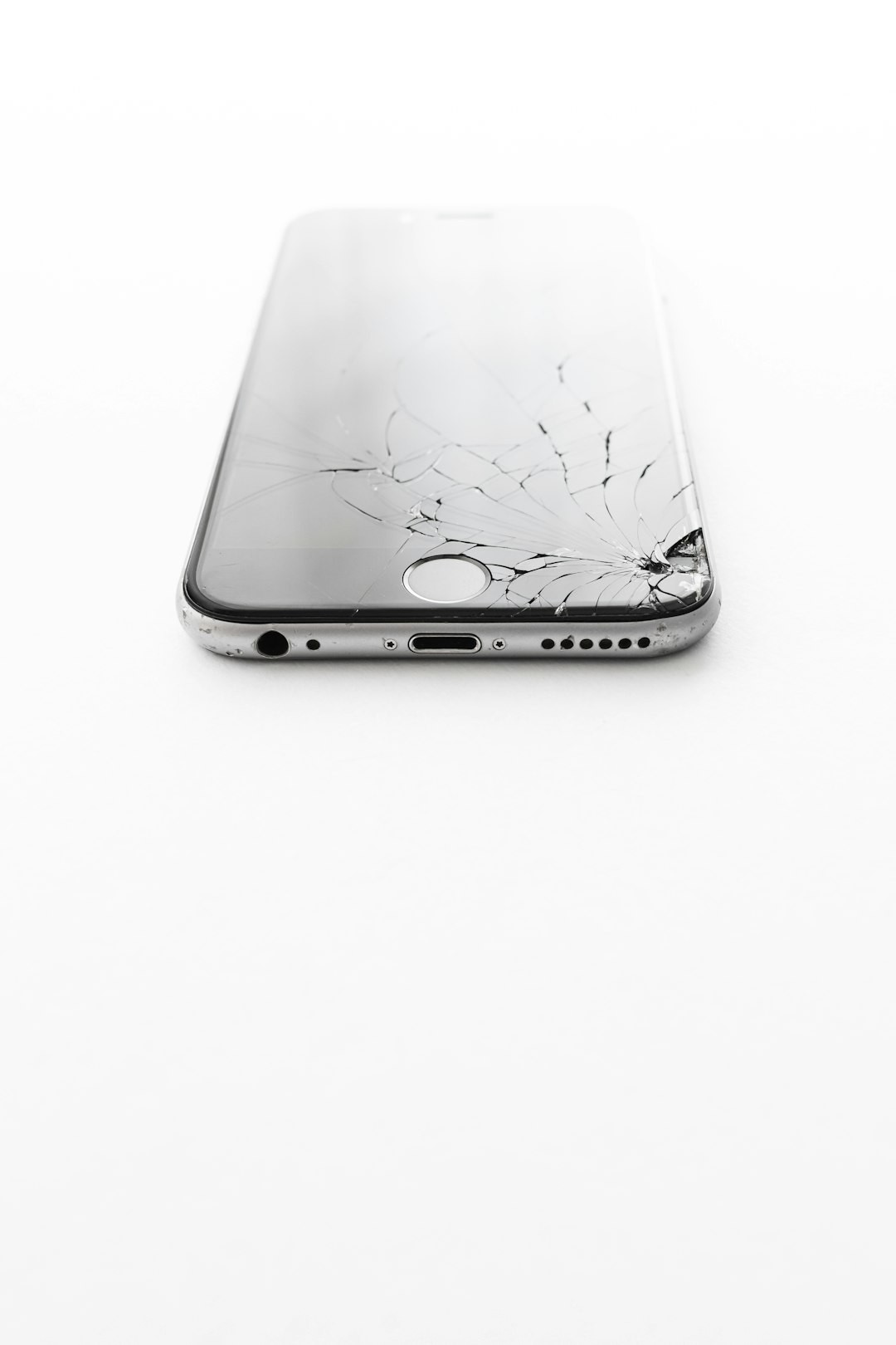 minimal image of broken iPhone glass